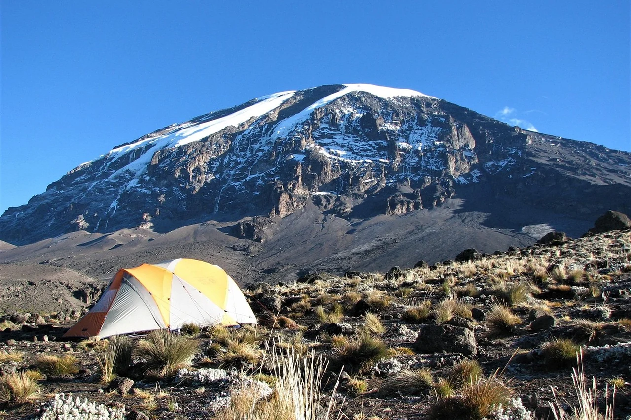 Expedition tent below the summit massif of Mount Kilimanjaro